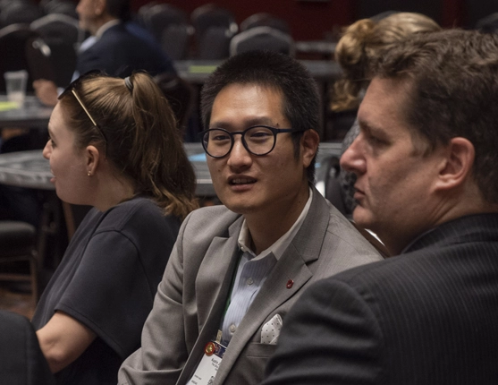 Image: Early Career Members at a table