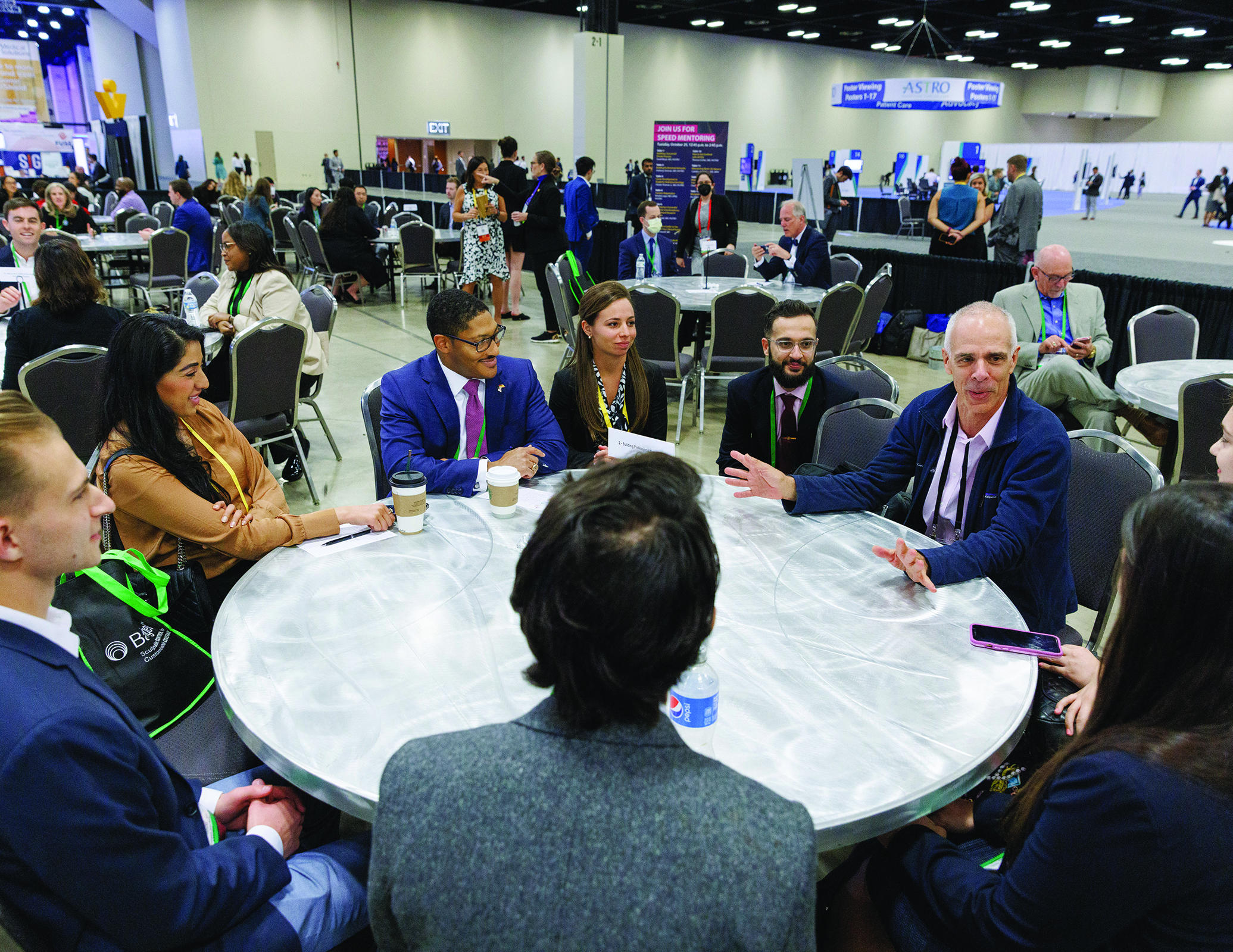 Image: Early Career Members at a table during speed mentoring session